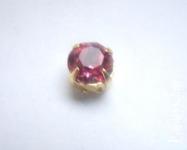 46грн(2шт) Кристали  Шатони  пришивні Swarovski 1088 7mm(ss34 ) Rose в цапах золото 1038g