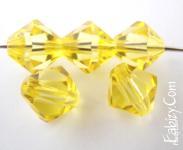 90грн(36шт) Намистини біконуси  кришталеві  Preciosa  10мм Shine Yellow. ОПТ